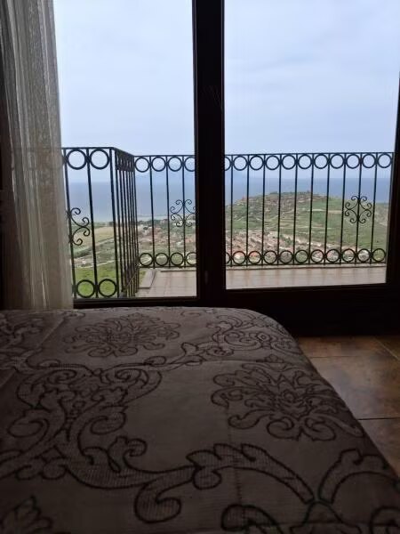 Deluxe Oda yatak detayı